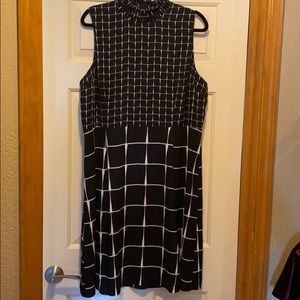 High neck. Sleeveless Dress